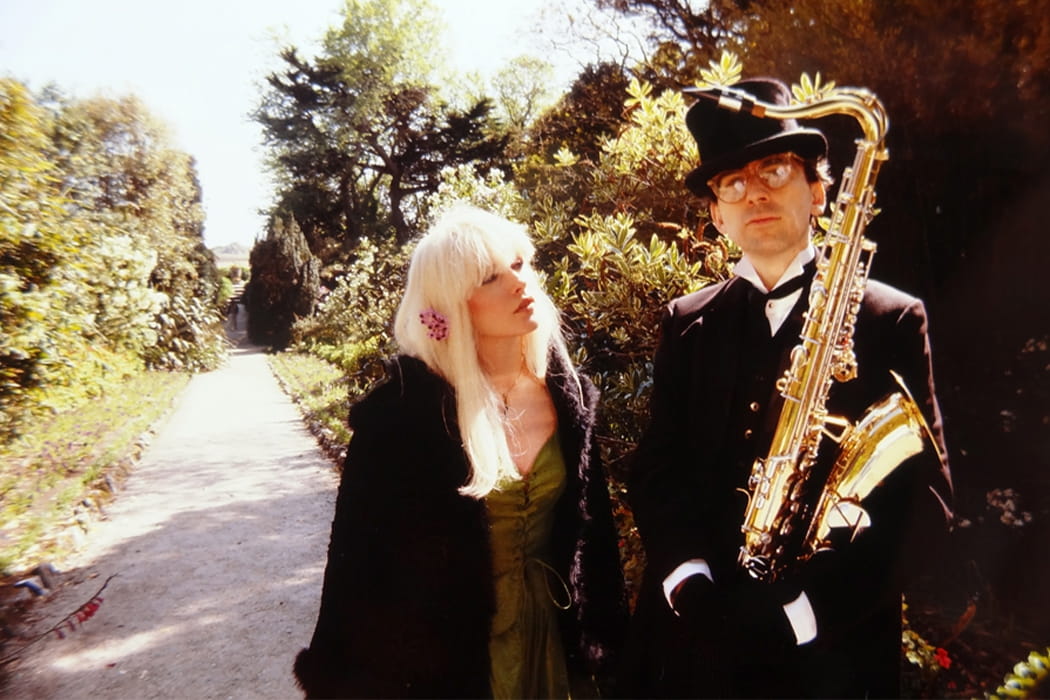 Blondie with a saxophone player on Tresco, Isles of Scilly
