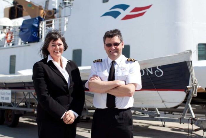 Dave Redgrave (Scillonian III Captain) and Marcia (Purser) standing in front of Scillonian III ferry