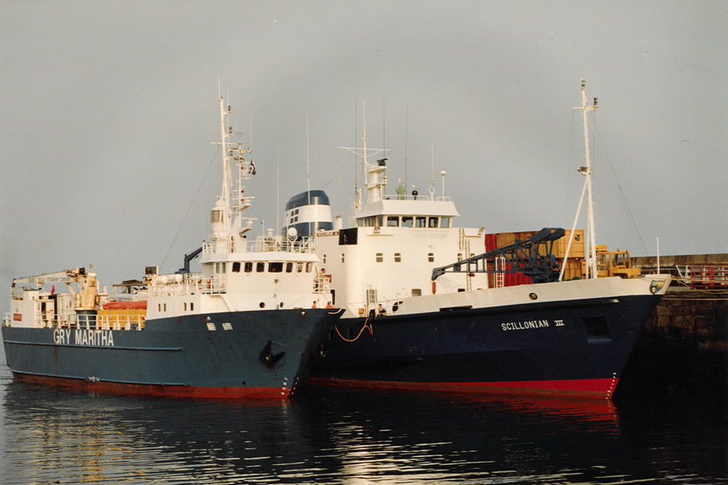 Scillonian III painted blue alongside Gry Martitha, Penzance, Cornwall