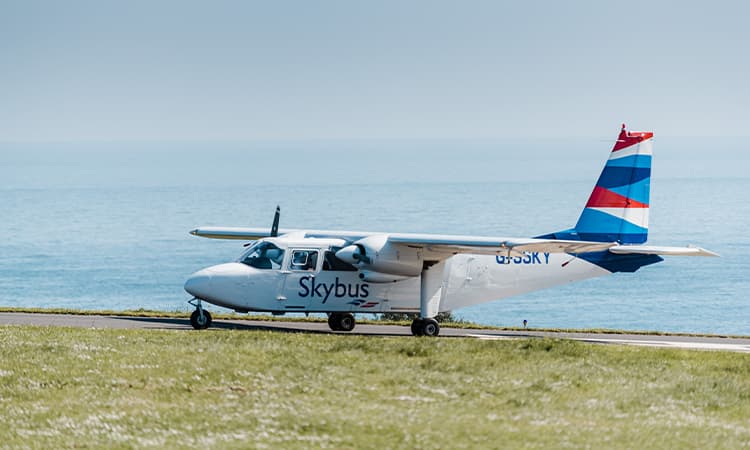Skybus Islander aircraft on the airfield at St Mary's Airport, Isles of Scilly