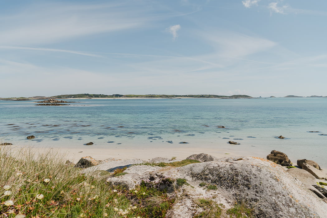 view of St Martin's from Tresco Pentle Bay on a spring sunny day, Isles of Scilly