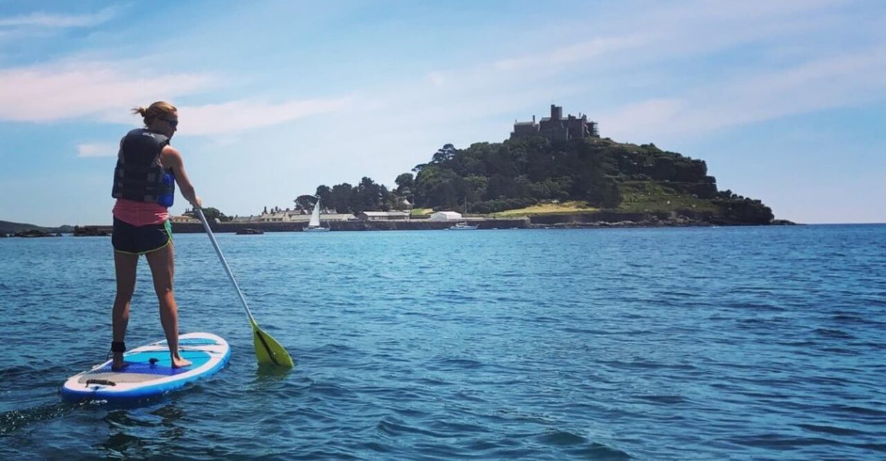 Helen Glover paddleboarding, St Michael's Mount, Penzance, Cornwall