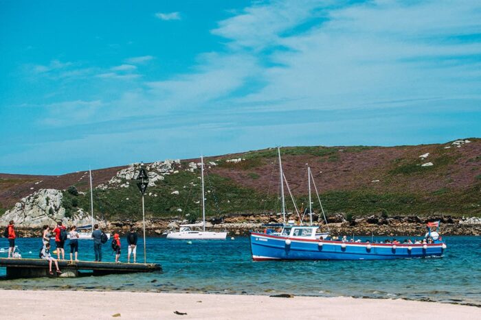 Tripper boat coming alongside Church quay on Bryher, Isles of Scilly