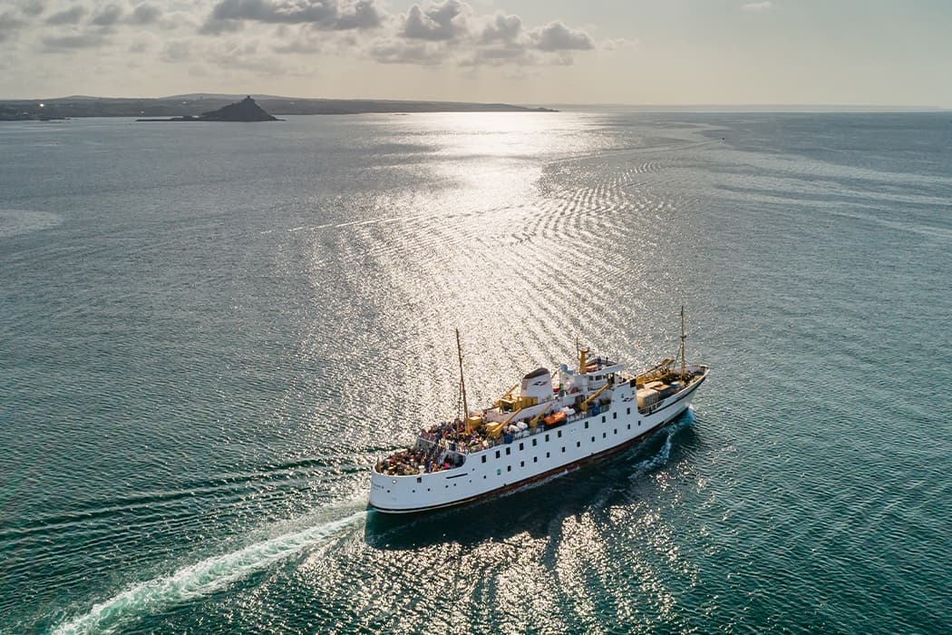Scillonian III sailing passed St Michael's Mount, Penzance, Cornwall