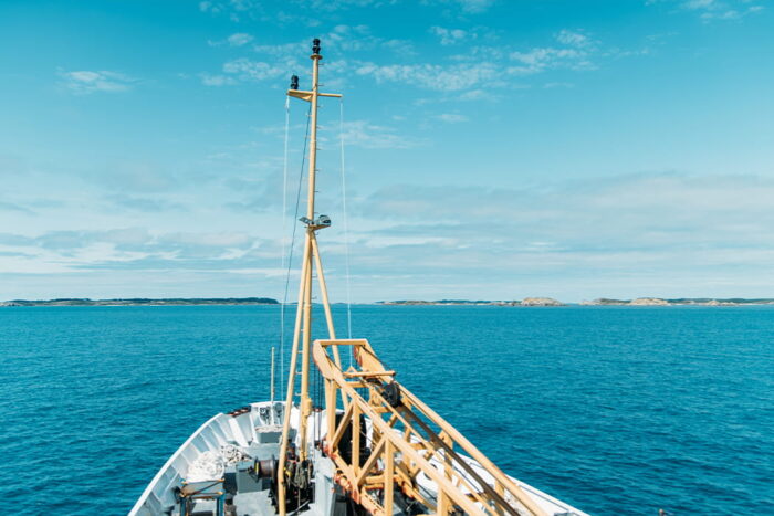 Scillonian III sailing towards the islands on the horizon