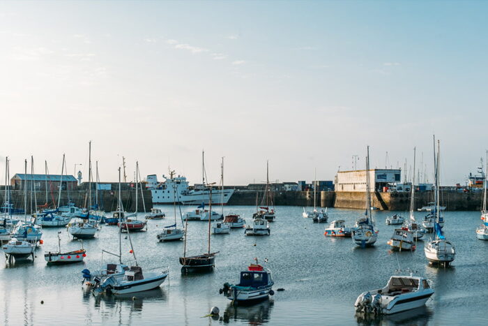 Scillonian III alongside South Pier in Penzance, Cornwall on a sunny morning