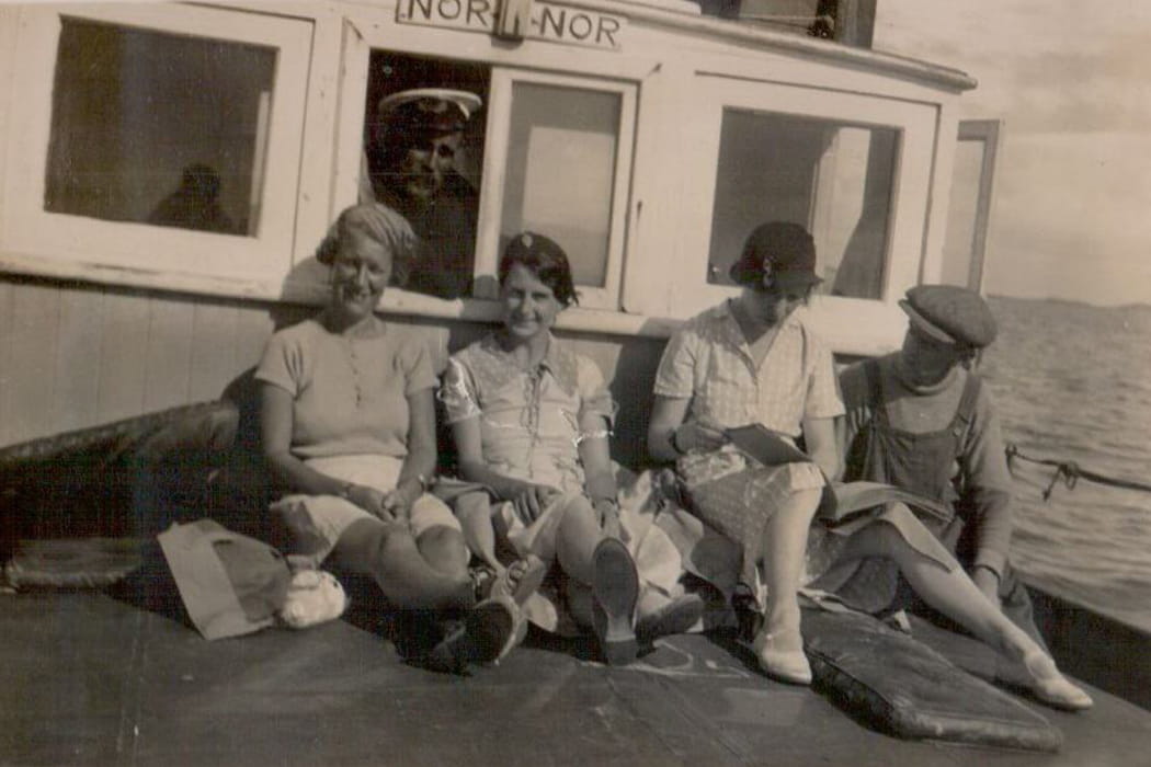 Captain and passengers on board the inter-island launch boat - Nor Nor