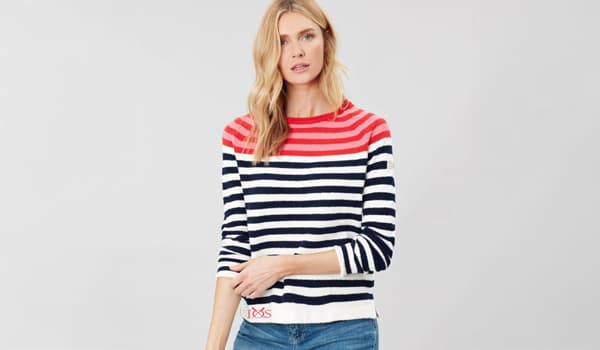 Woman wearing a striped jumper from IOS store