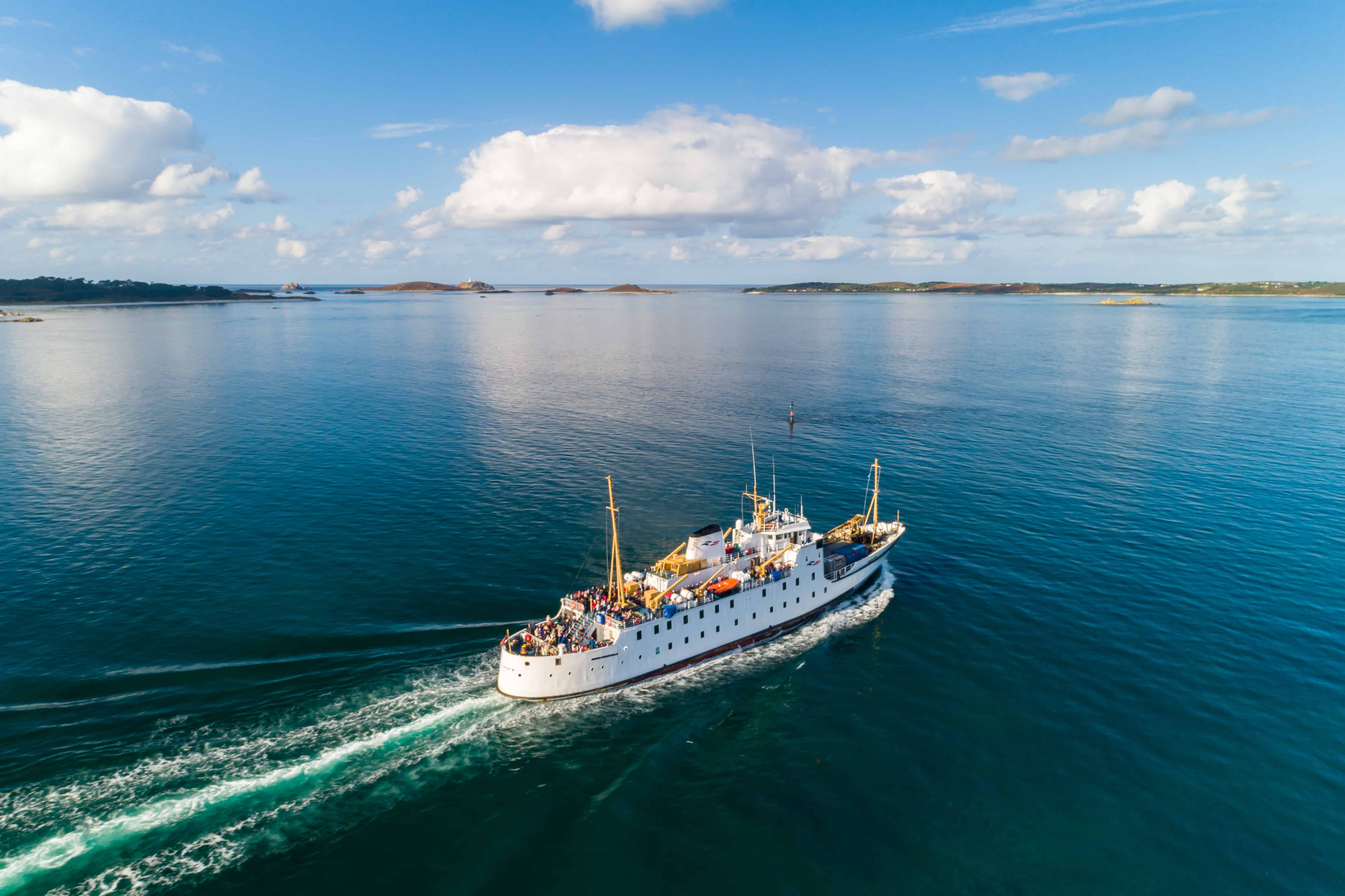 Scillonian III ferry sailing past Halangy Point, Isles of Scilly