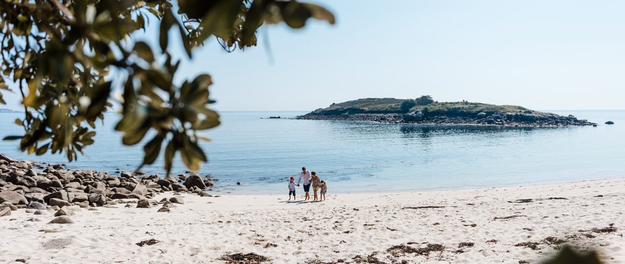 Family on the beach at Pelistry Bay, St Mary's - Isles of Scilly