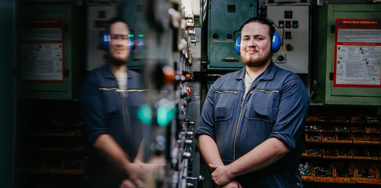 Engineer cadet Connor Norris standing in Scillonian III engine room