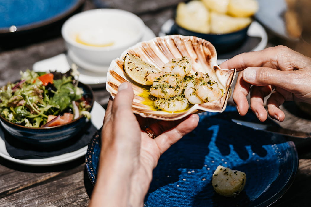 seafood lunch served outside at Karma Hotel, St Martin's, Isles of Scilly