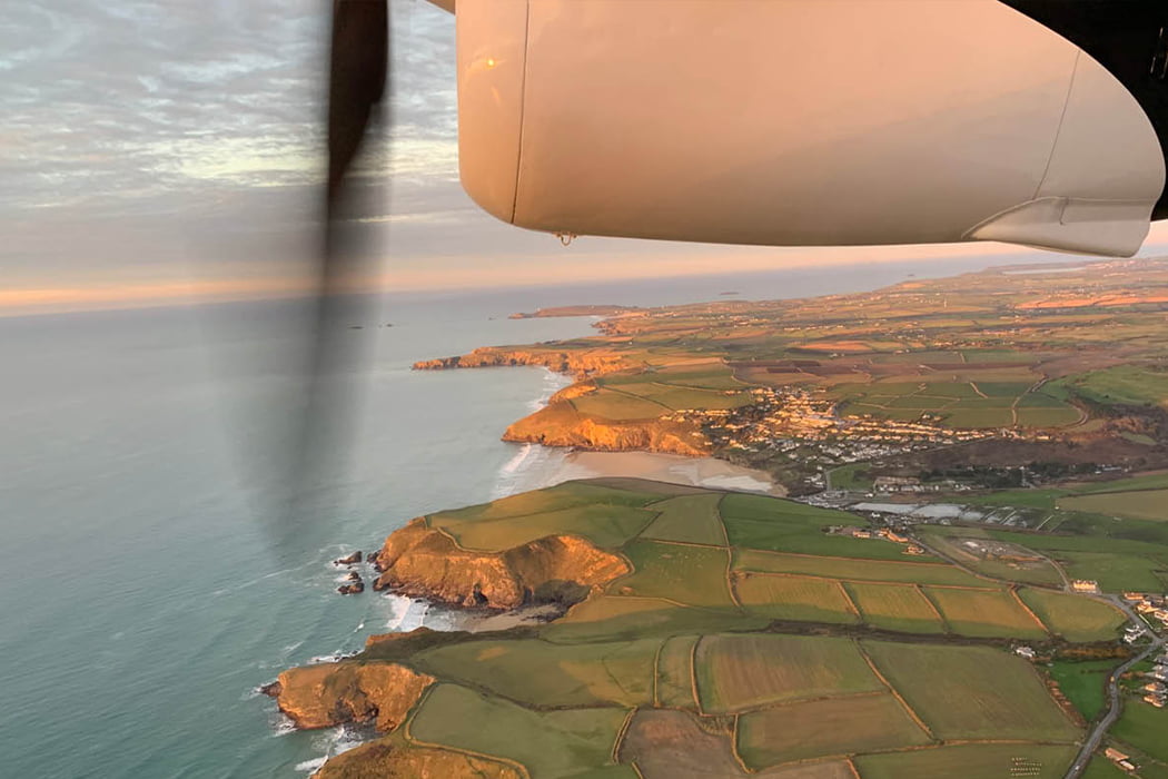 view of west Cornwall coastline in the evening from Skybus aircraft