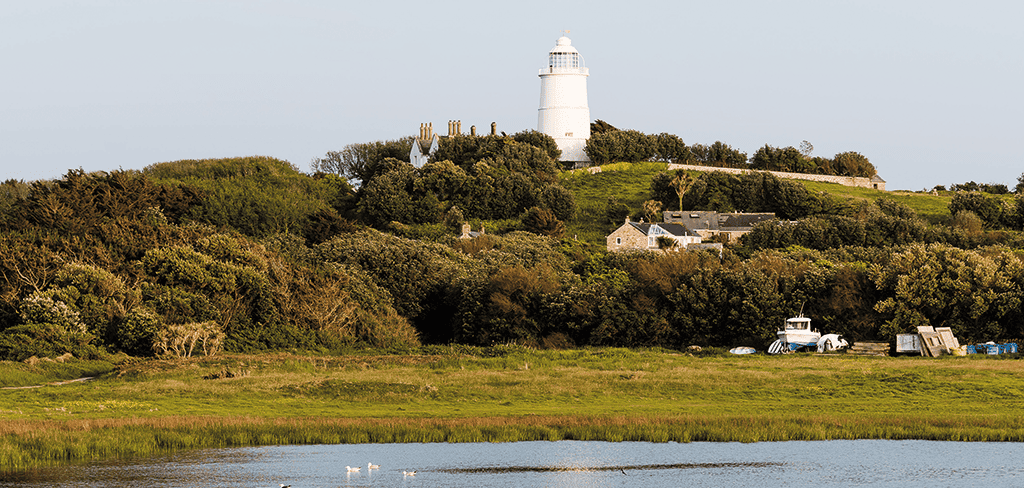 view of St Agnes Lighthouse in the evening on St Agnes in the Isles of Scilly