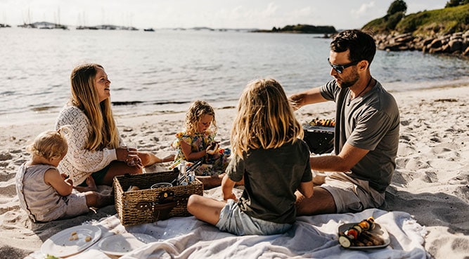 Family having an evening BBQ on the beach - Porthmellon, St Mary's, Isles of Scilly