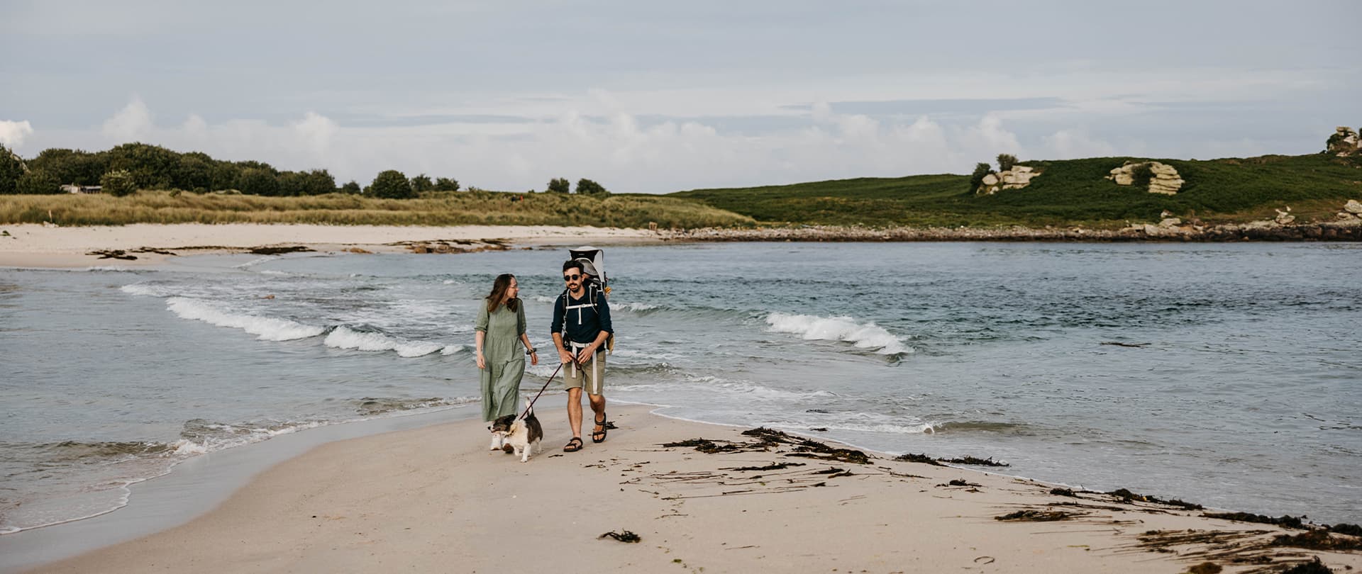 Family walking along the beach - The Bar, St Agnes, Isles of Scilly