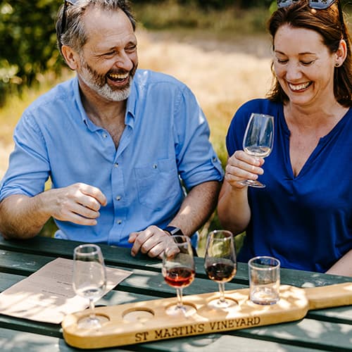 couple wine tasting - St Martin's Vineyard - Isles of Scilly