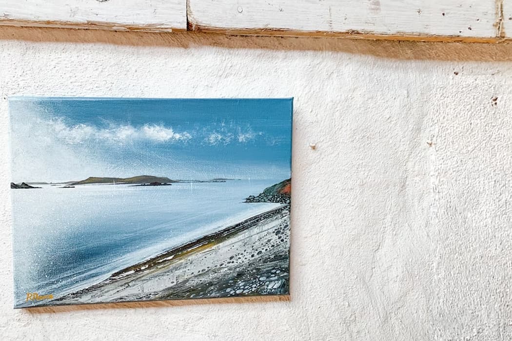 Richard Pearce's artwork hanging in the Golden Eagle Studio, Bryher, Isles of Scilly
