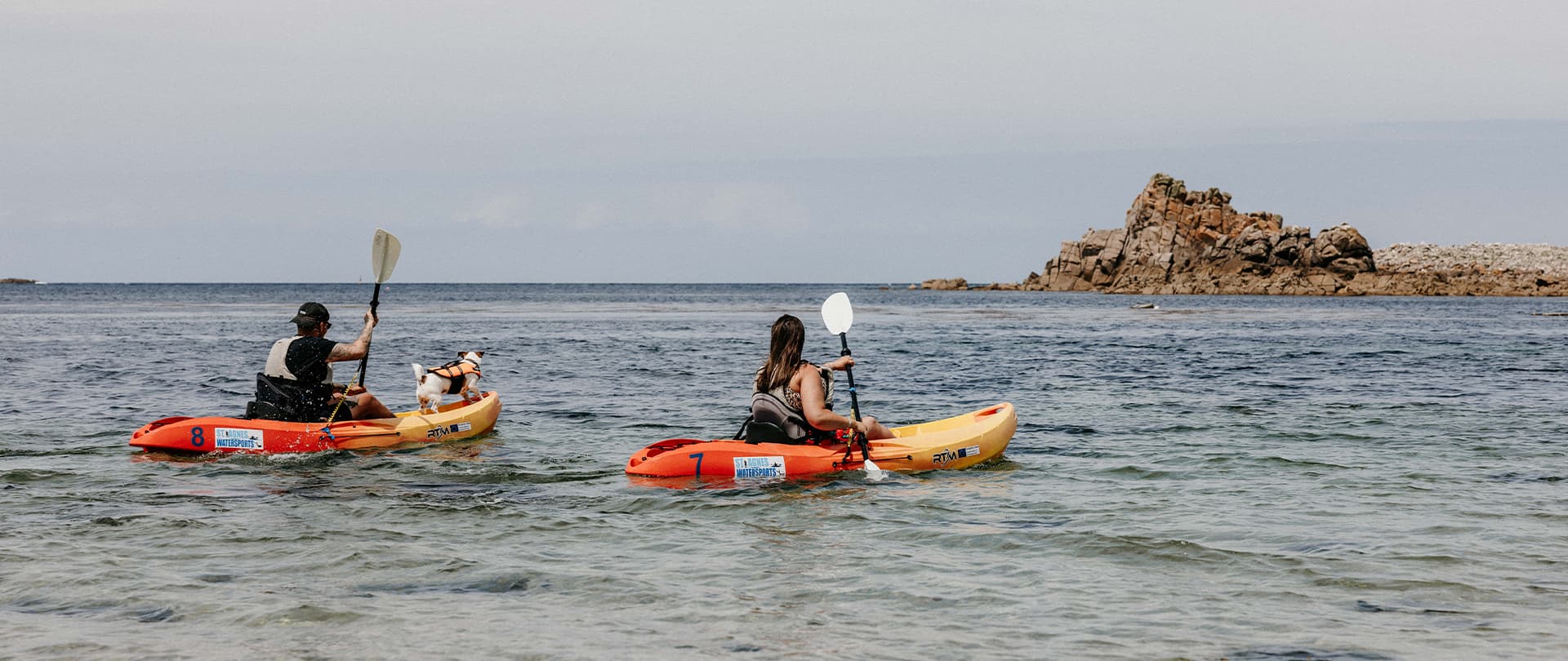 couple with their dog kayaking - St Agnes Watersports, Isles of Scilly