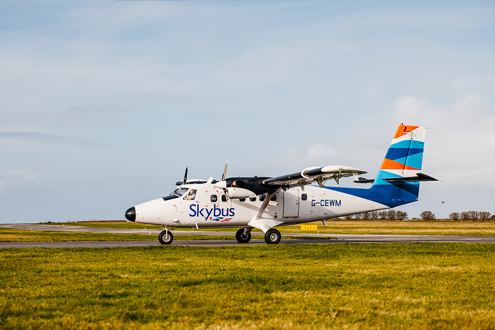 Skybus Twin Otter on the runway in spring at Land's End Airport, Cornwall