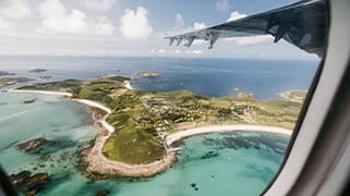 view of st martin's from a skybus twin otter - isles of scilly travel