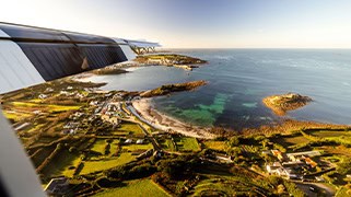 view of st mary's from a skybus twin otter - isles of scilly travel