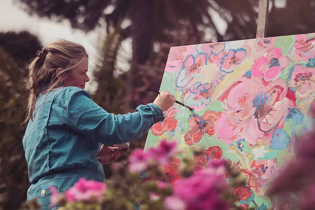 Emily Powell painting flowers, Tresco Abbey Garden