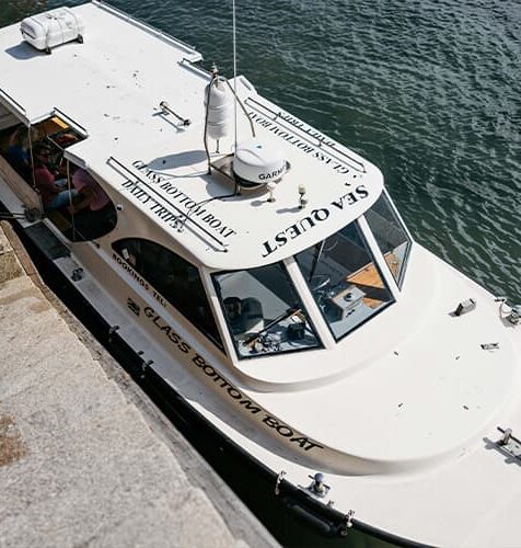 People boarding Seaquest for a glass bottom tour of the Isles of Scilly