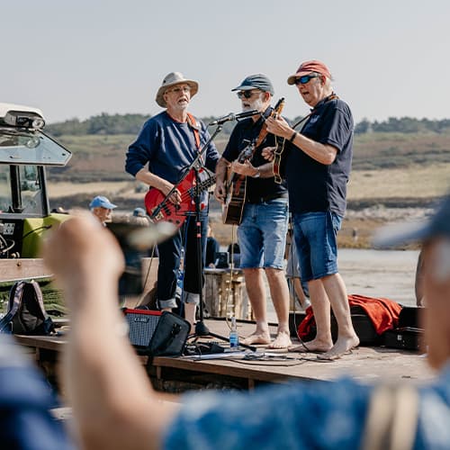 Band playing during the low tide event, Isles of Scilly