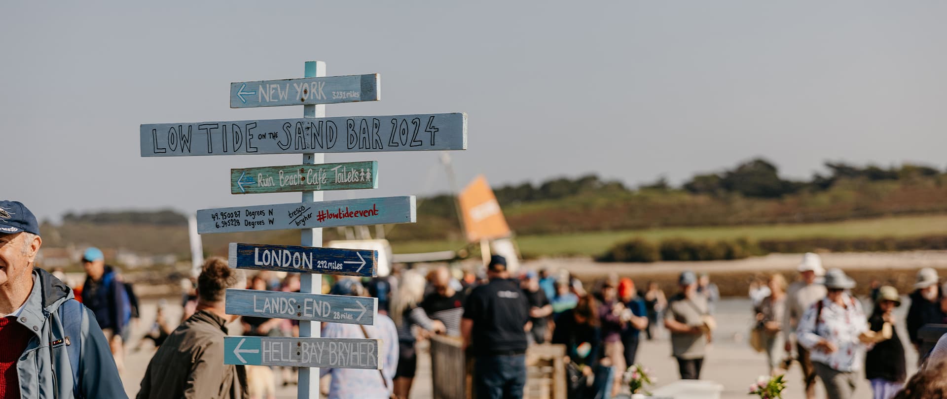 Directional signpost, low tide event, Isles of Scilly