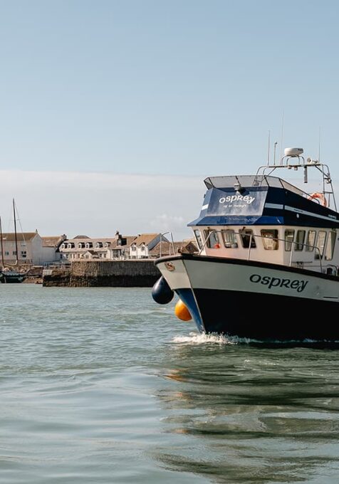 Osprey tripper boat departing St Mary's Quay, Isles of Scilly