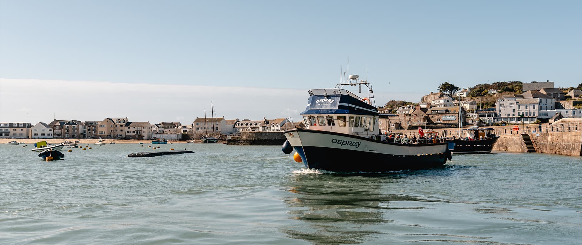 Osprey tripper boat departing St Mary's Quay, Isles of Scilly