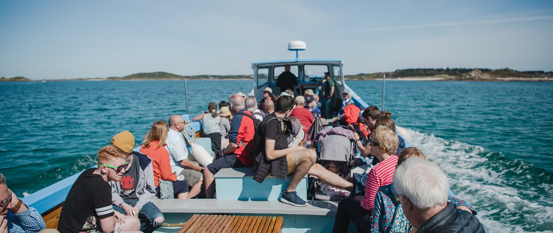 St Mary's Boatmen's association tripper boat with passengers on, Isles of Scilly