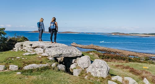 Friends at Innisidgen burial chamber, St Mary's, Isles of Scilly