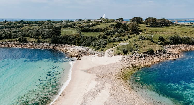 view of St Agnes and the lighthouse from The Bar - Isles of Scilly