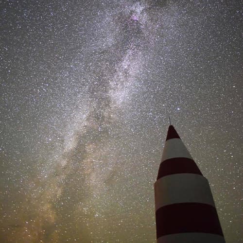Bruce Frank Daymark with the night sky showing the milky way, st martin's, isles of scilly
