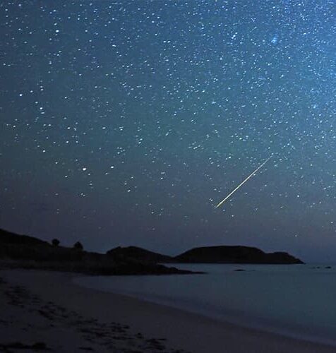 Bruce Frank - night sky with meteors over the Eastern Isles, St Martin's, Isles of Scilly