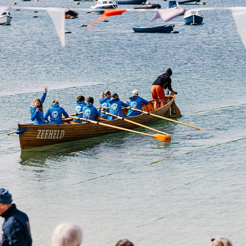 Gig boat getting ready to race, St Mary's, Isles of Scilly