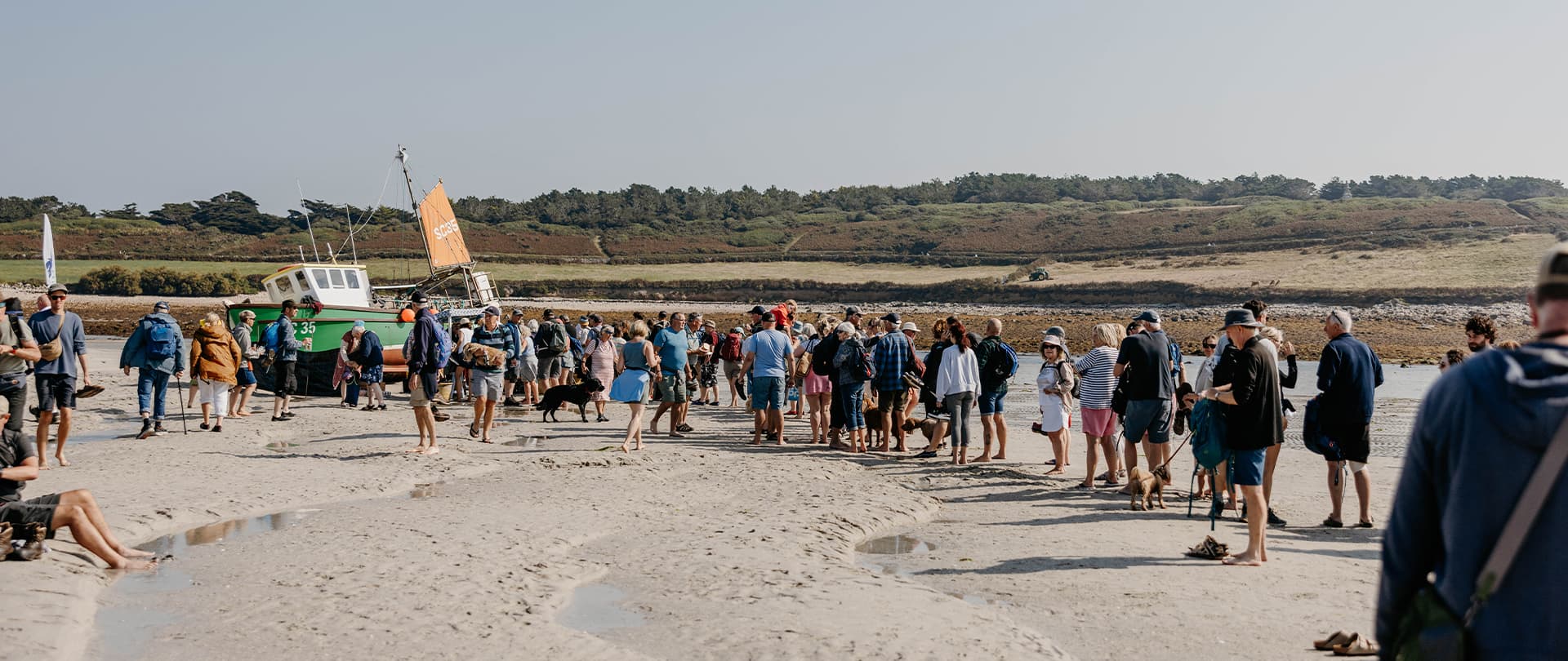 People enjoying the low tide event, Isles of Scilly