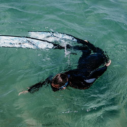 Woman snorkeling, St Martin's, Isles of Scilly