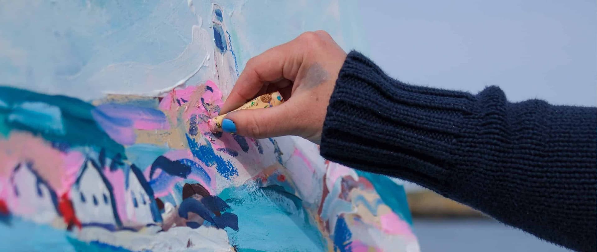 artist painting a landscape on the Isles of Scilly