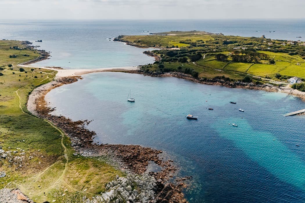 Drone view of the sandbar connecting St Agnes to Gugh - The bar beach, Isles of Scilly