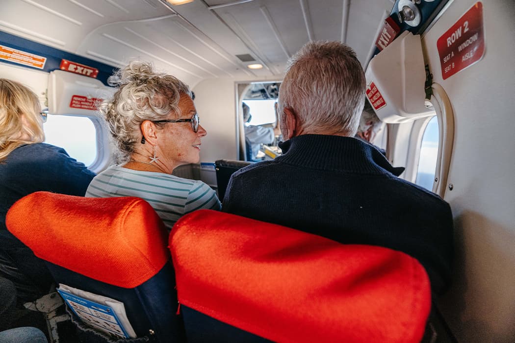 passengers inside a Skybus Twin Otter aircraft