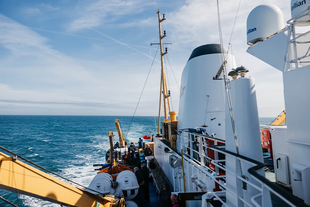 Scillonian III, passengers on the outside deck on a sunny day, Isles of Scilly Travel