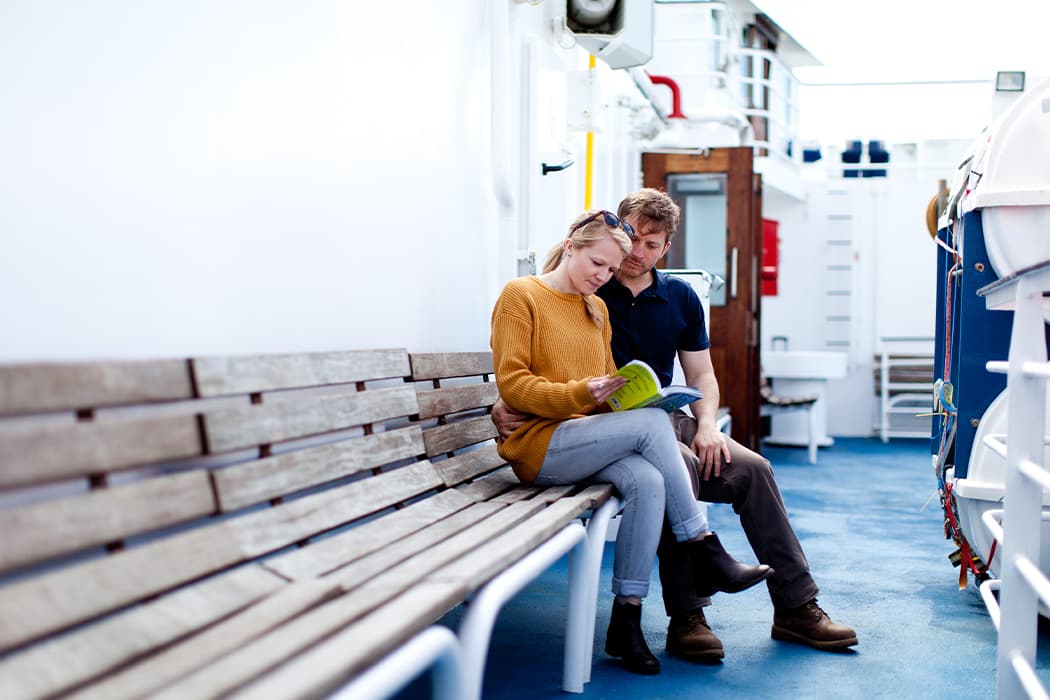 couple sitting outside on Scillonian III