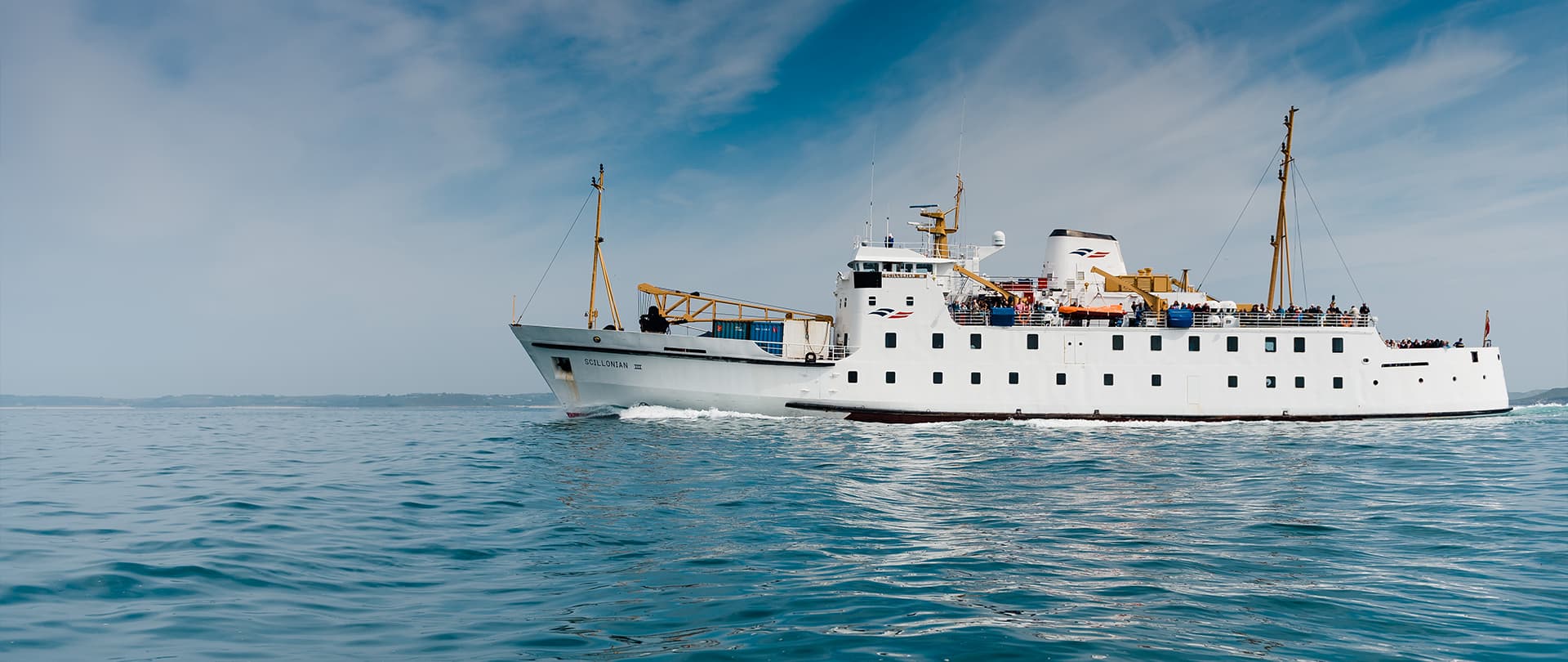 Scillonian III sailing towards St Mary's in spring