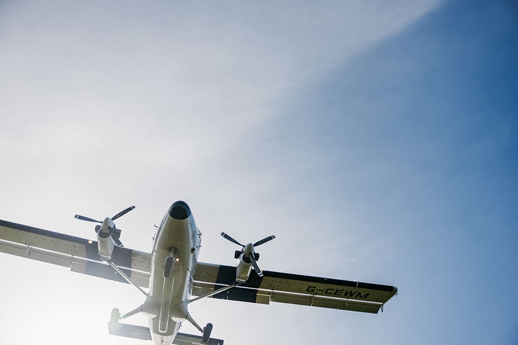 seeing underneath of a Skybus Twin Otter aircraft whilst flying