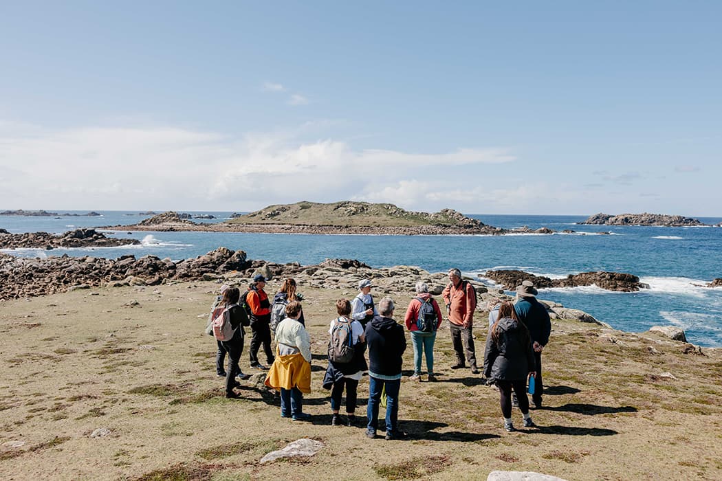 walking tour group around Bryher, Isles of Scilly