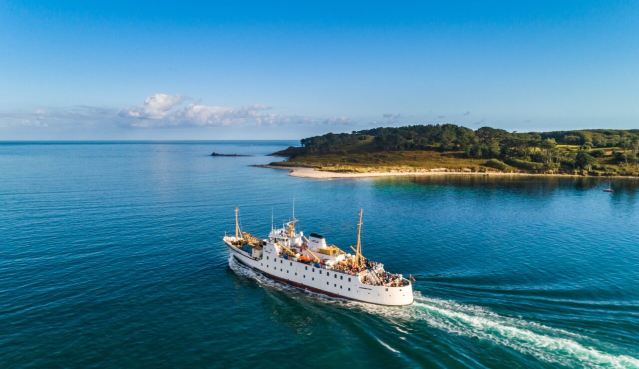 Scillonian III passenger ferry sailing towards the Isles of Scilly near Helangy Point