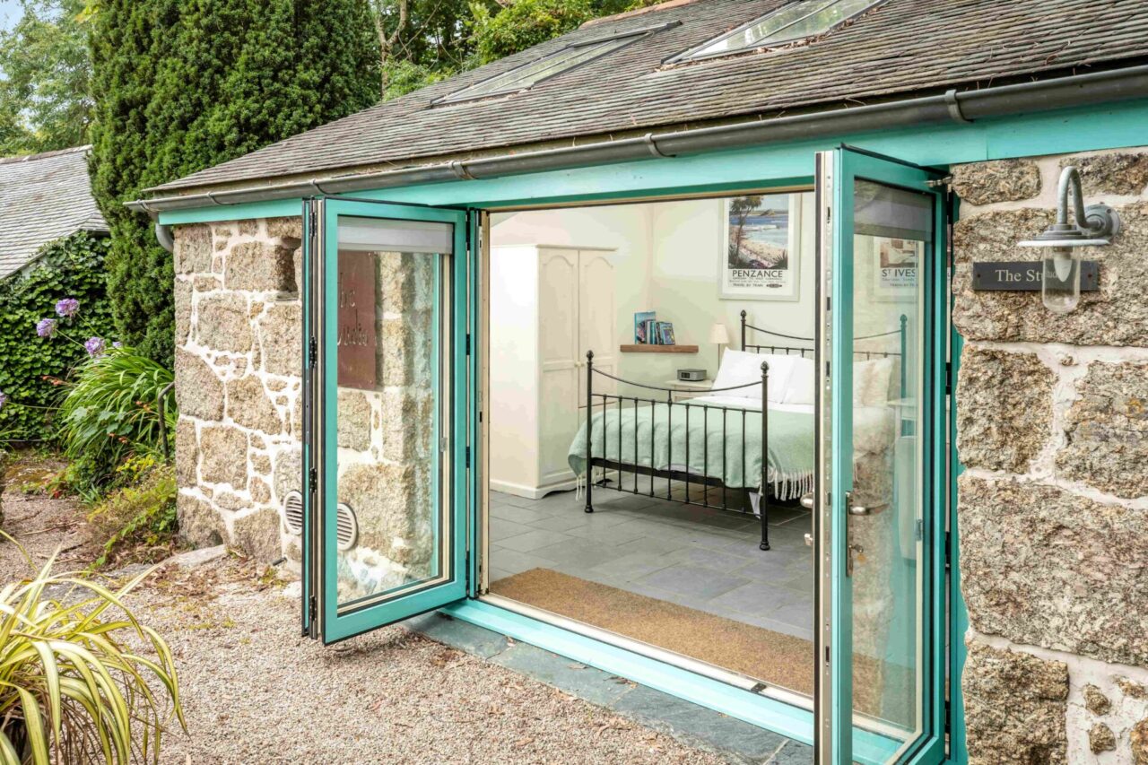 Patio doors leading our to the garden at the studio at Alsia Mill